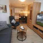 Wohnbereich mit ausziehbarer Couch (Liegefläche 144cm x 200cm) Wohnbereich